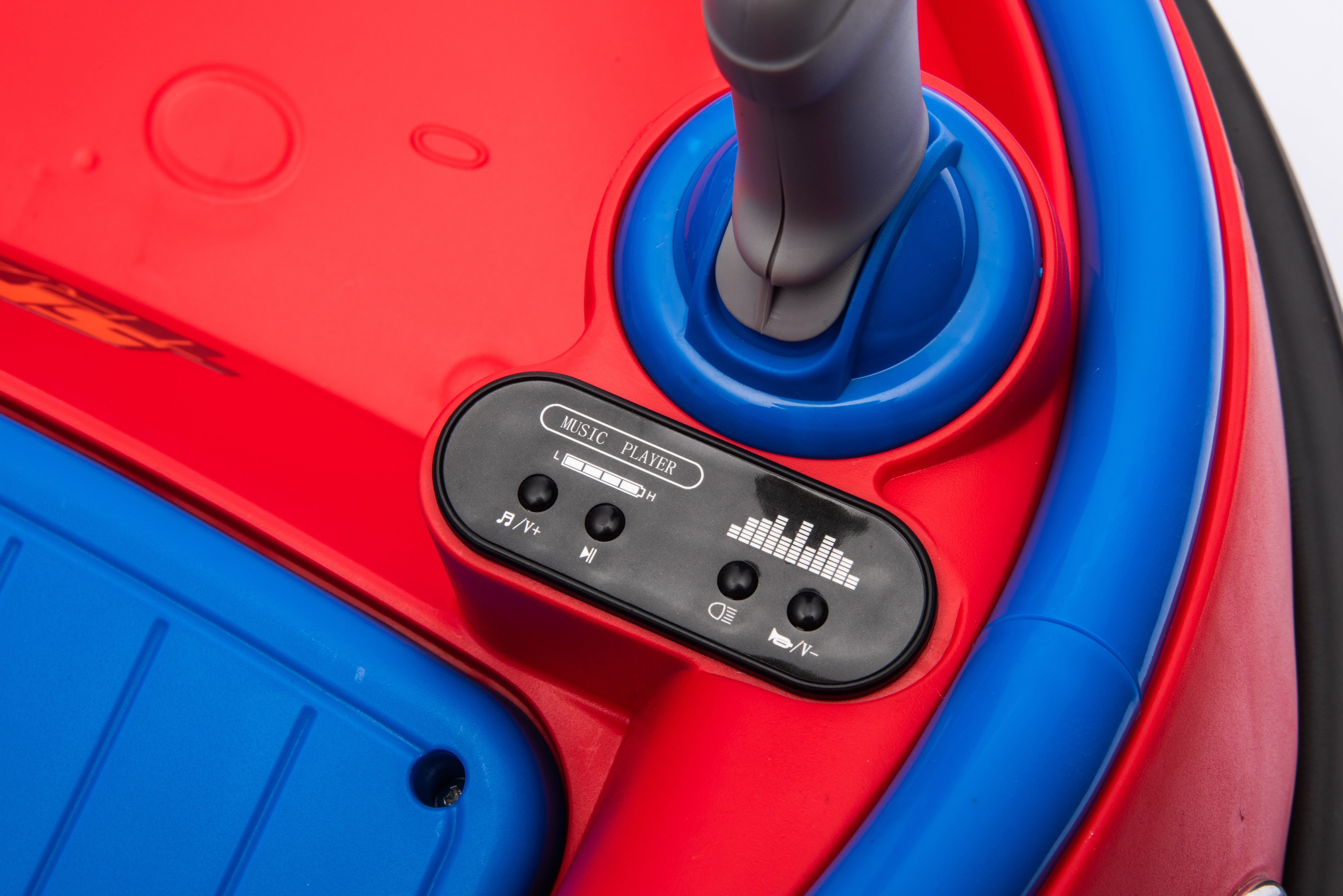 Close-up of the music player and joystick controls on a red and blue 12V kids bumper car ride-on toy.