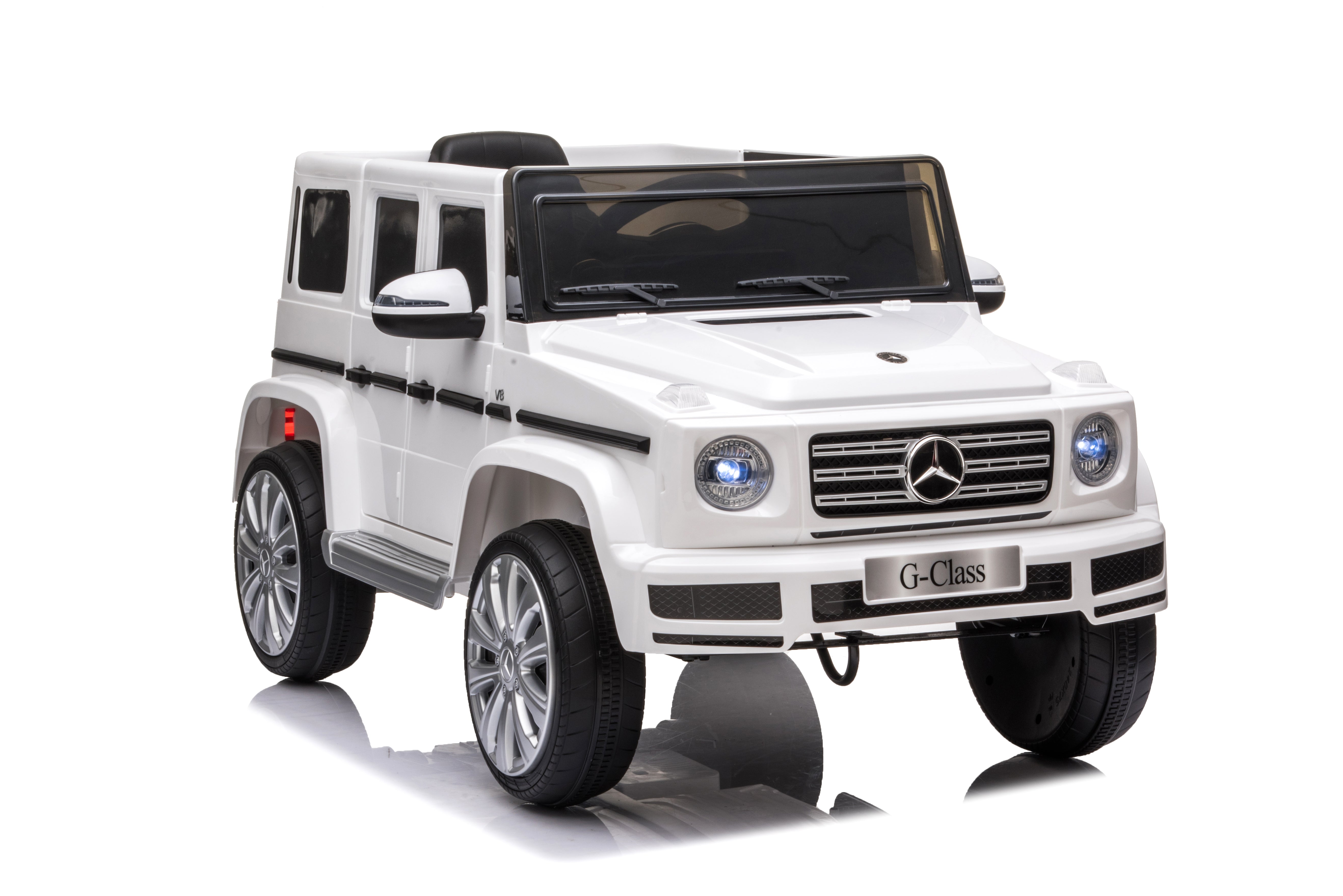 White 12V licensed Mercedes G-Wagon G63 kids electric ride-on car with realistic detailing and large wheels