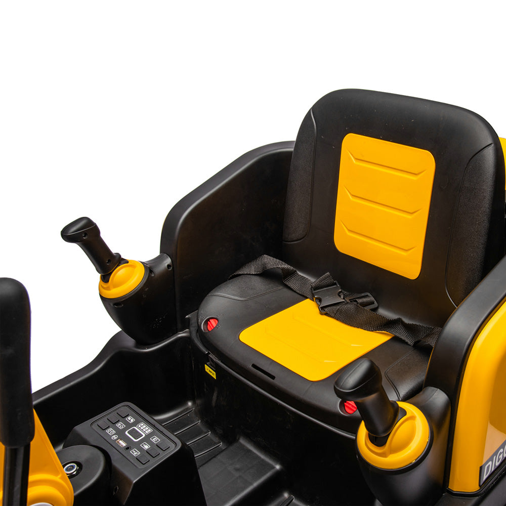Close-up of the yellow and black seat with safety belt and dual joystick controls on kids ride-on excavator digger.