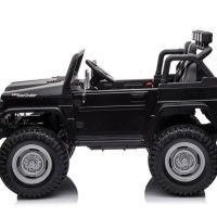 Black kids ride-on SUV resembling a rugged off-road vehicle with large tires and open-top design, side view.