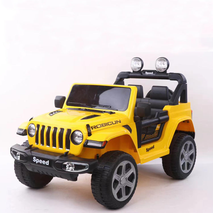 Yellow 12V kids Jeep Wrangler ride-on car with black roll bar and large off-road tires on white background