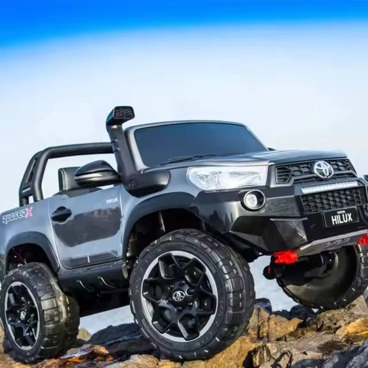 Grey Licensed Toyota Hilux Rugged 24V Kids Ride-On Car with 4x4, leather seats, and realistic SUV design for ages 3 and up