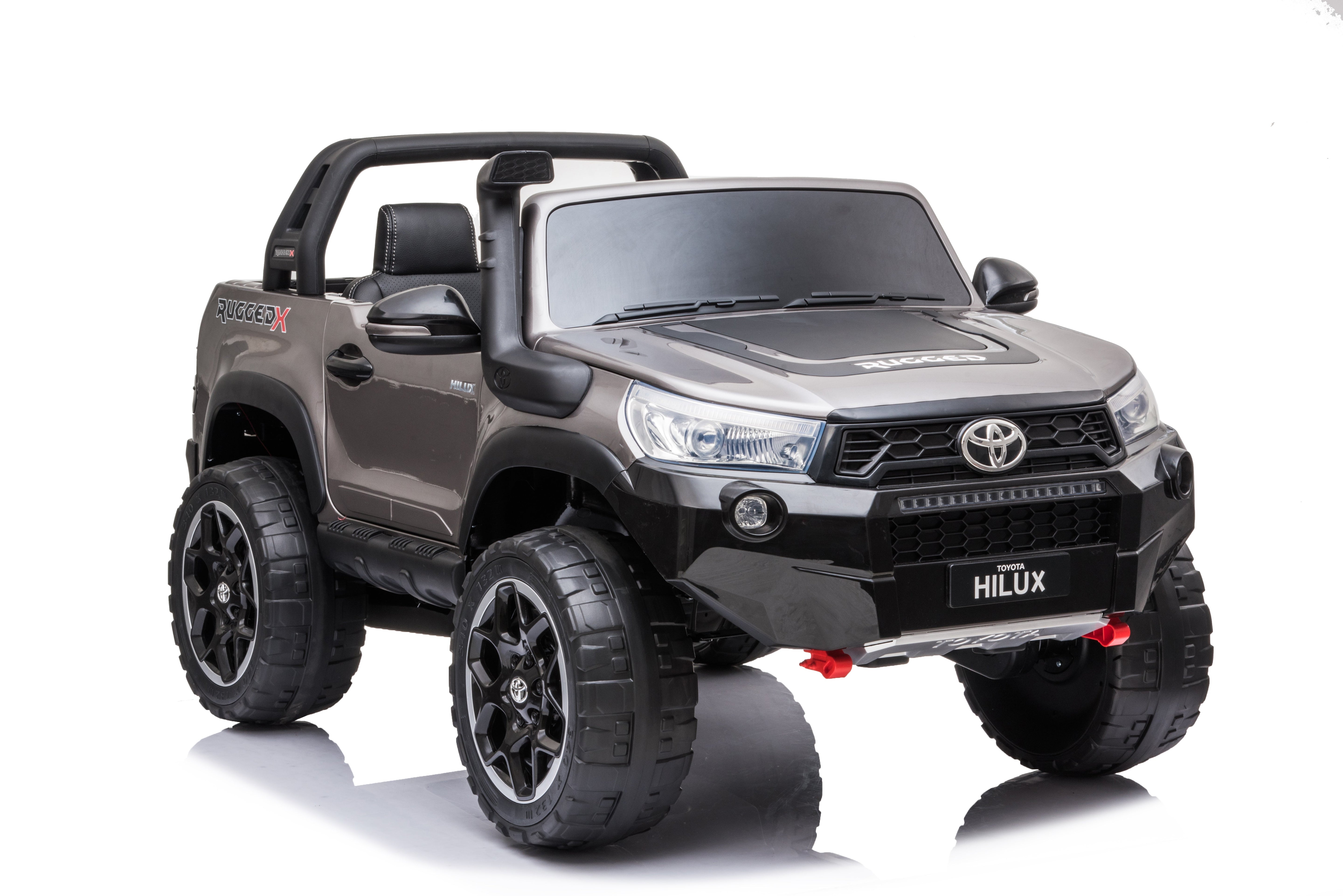 Grey Licensed Toyota Hilux Rugged 24V Kids Ride-On Car 800W 4x4 with 2 leather seats and LED headlights.