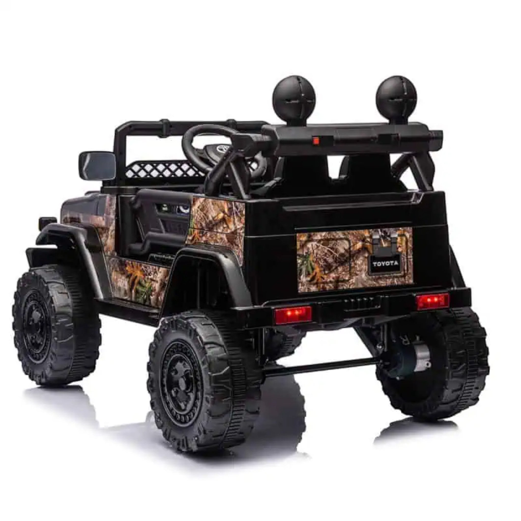 Rear view of Licensed Toyota FJ Cruiser 12V Kids Ride-On Car with camouflage design and large off-road tires