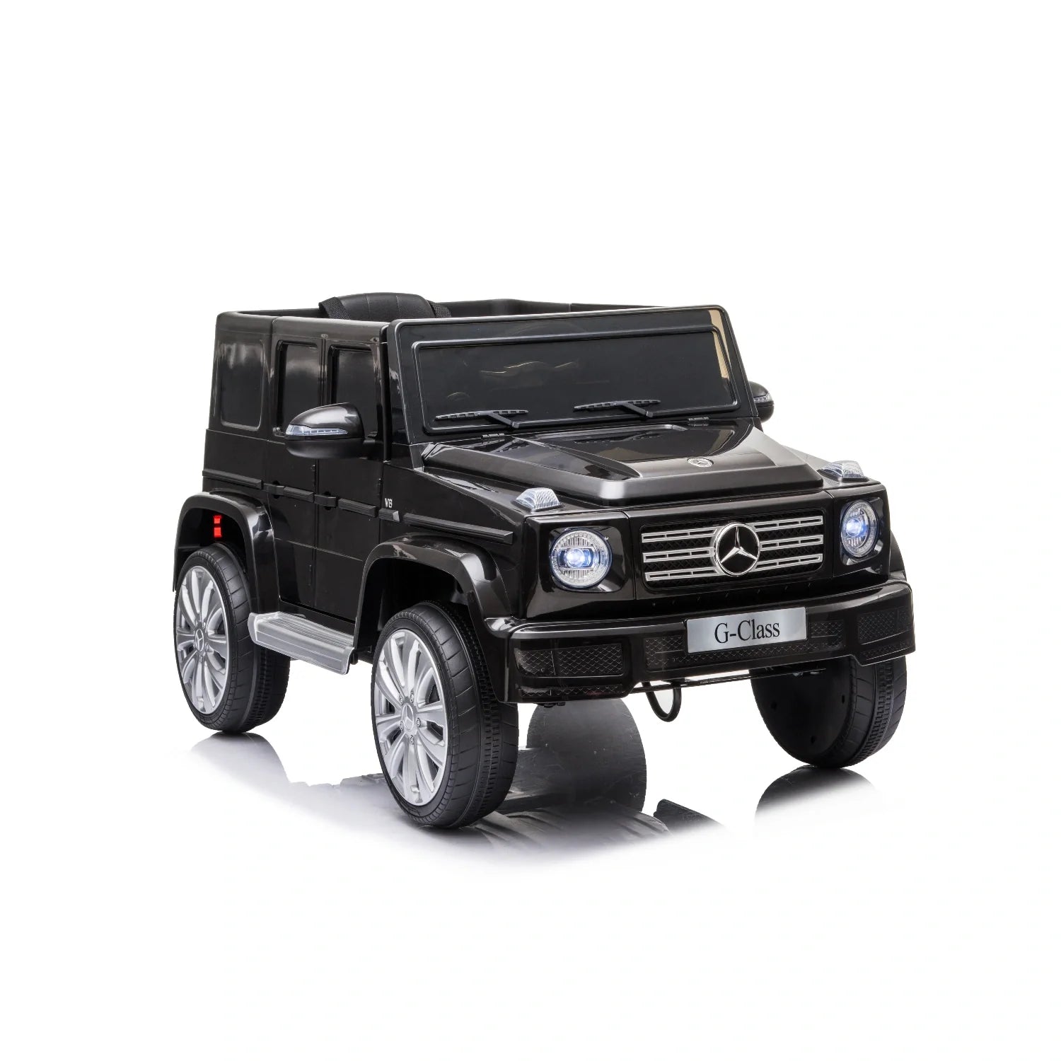 Black 12V licensed Mercedes G-Wagon G63 kids electric ride-on car with silver wheels on white background