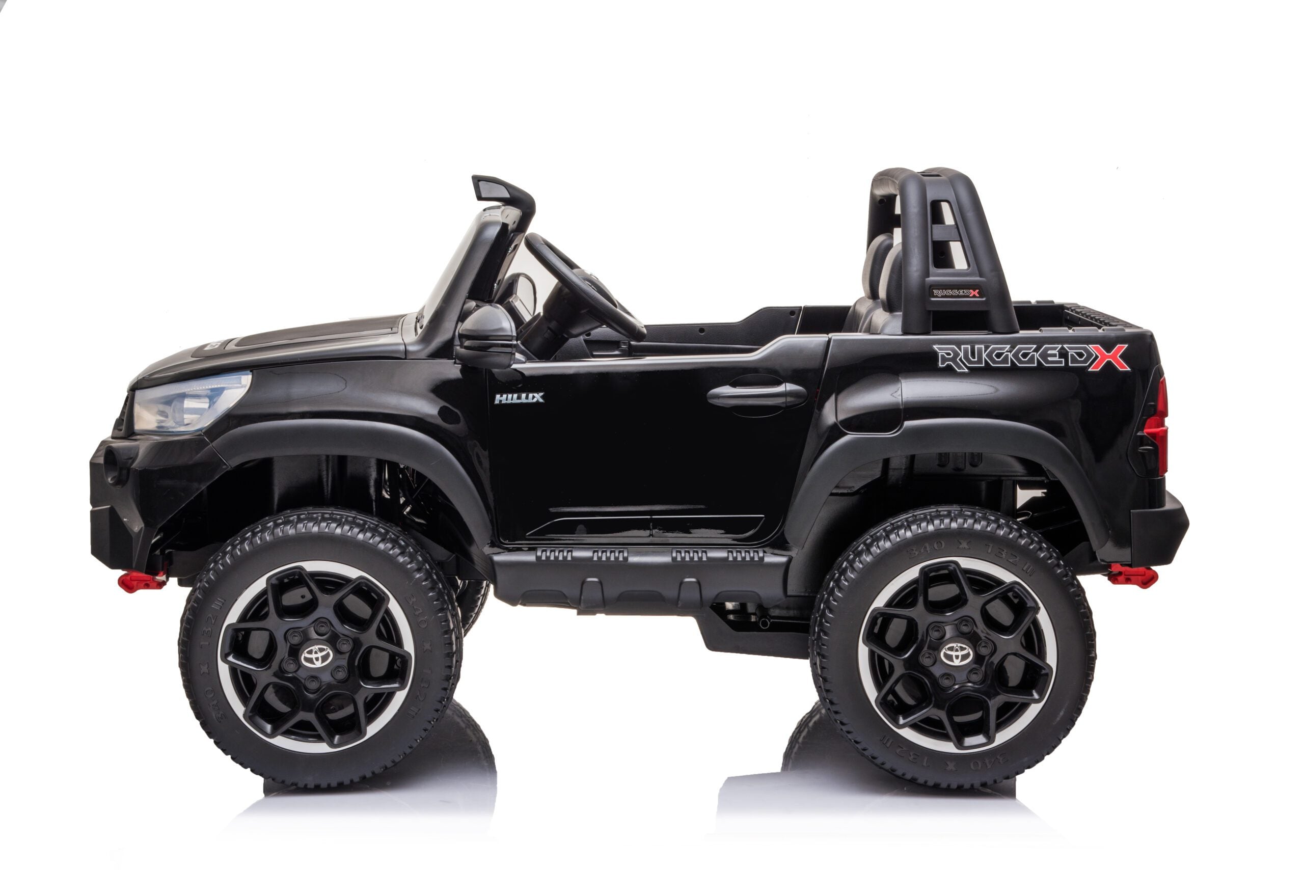 Black Licensed Toyota Hilux Rugged 24V kids ride-on car with large wheels and detailed design, 2-seater electric SUV toy.