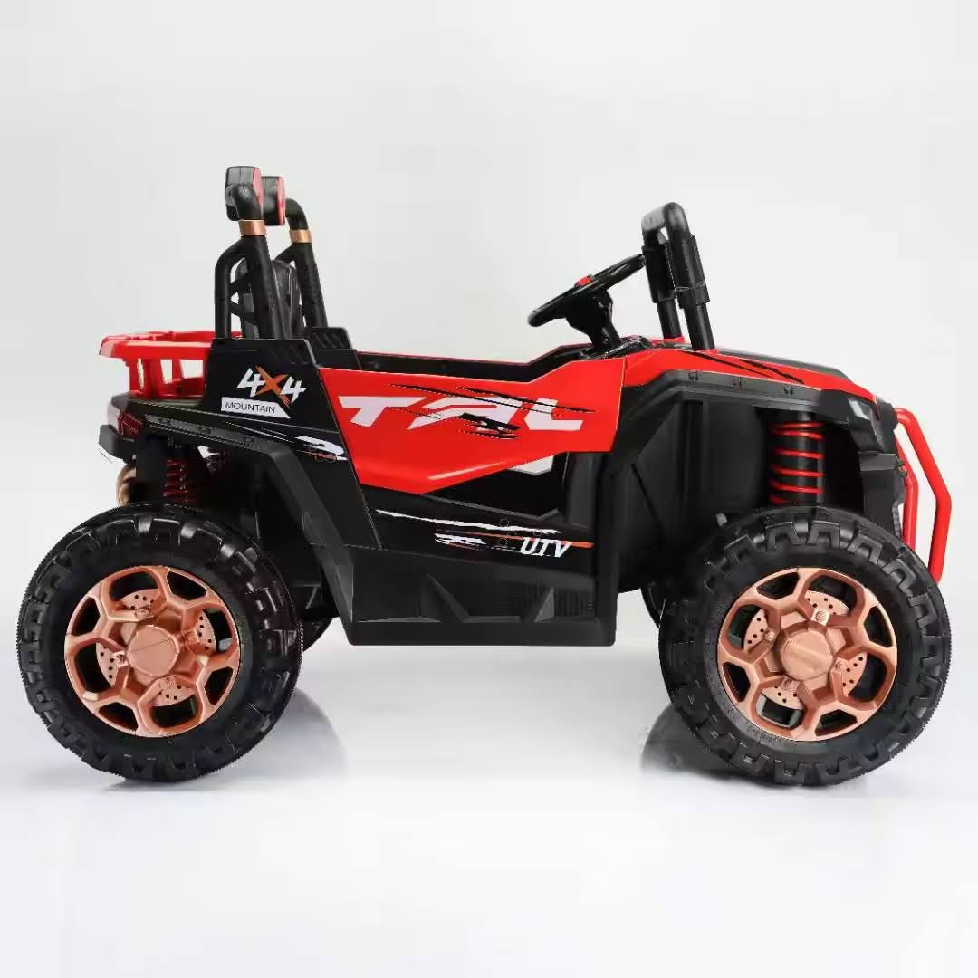 Red 24V 2-seater electric UTV beach buggy for kids with 4WD, canopy, seatbelts, and off-road tires.