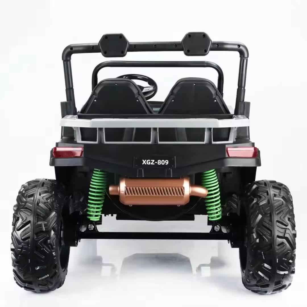 Rear view of black 2-seater electric UTV beach buggy with green suspension for kids aged 3 to 8 years.
