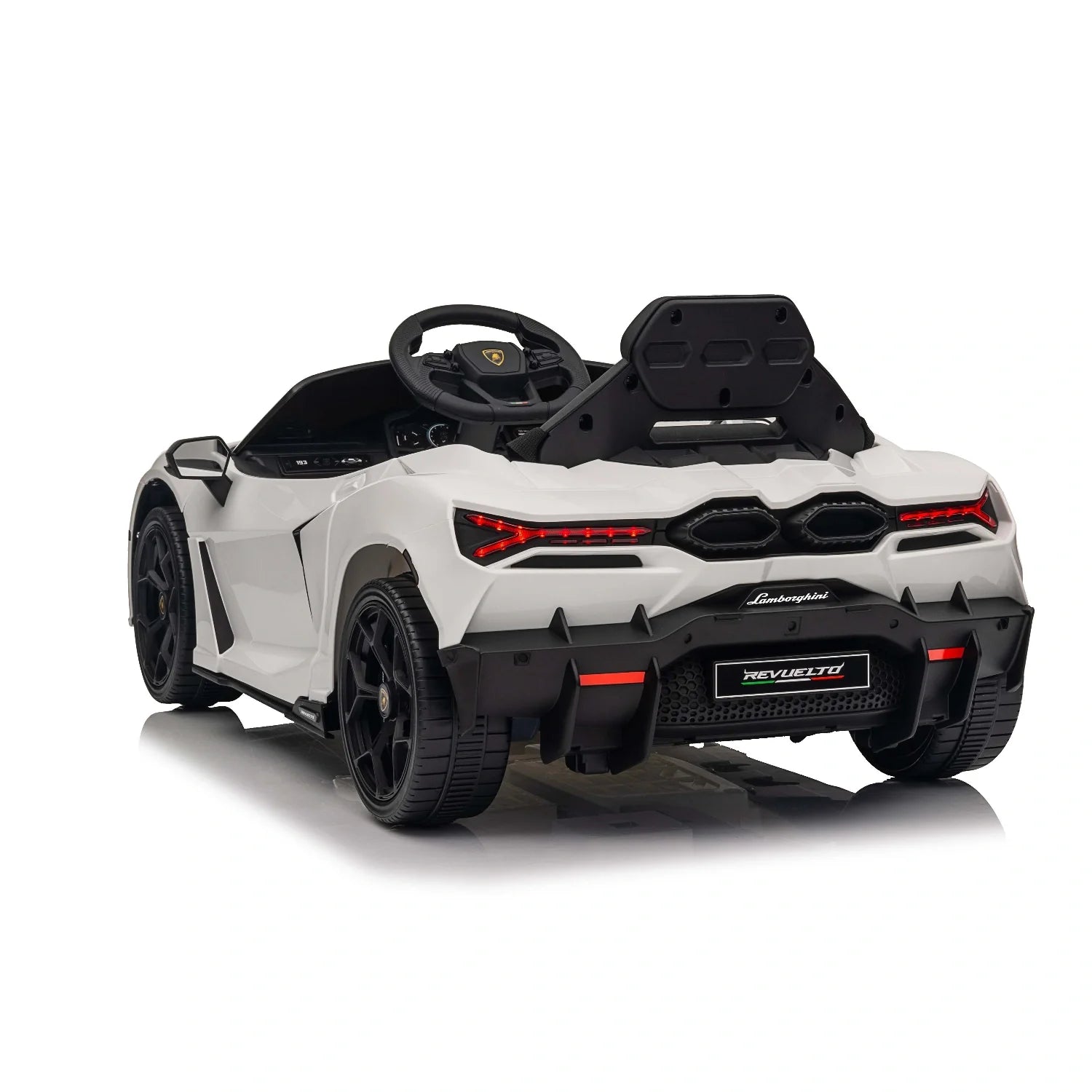 White 12V licensed Lamborghini Revuelto kids ride-on car shown from rear three-quarter angle on white background