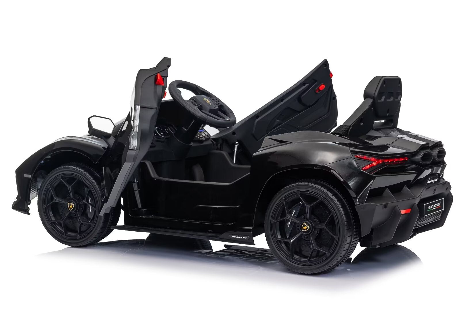 Black licensed Lamborghini Revuelto 12V kids ride-on car with opening doors and detailed interior features.