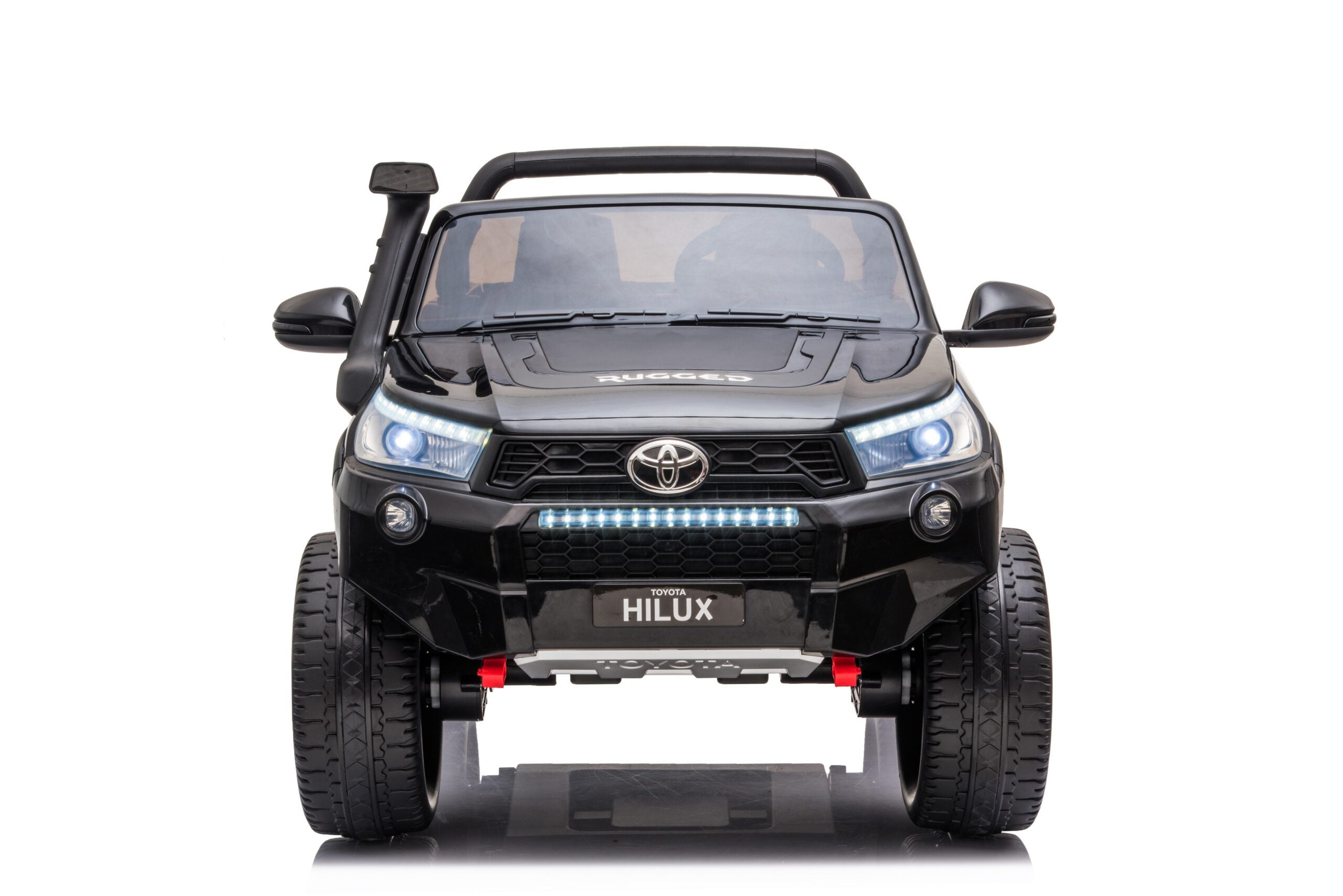 Front view of black Licensed Toyota Hilux Rugged 24V Kids Ride-On Car with LED headlights and large EVA tires