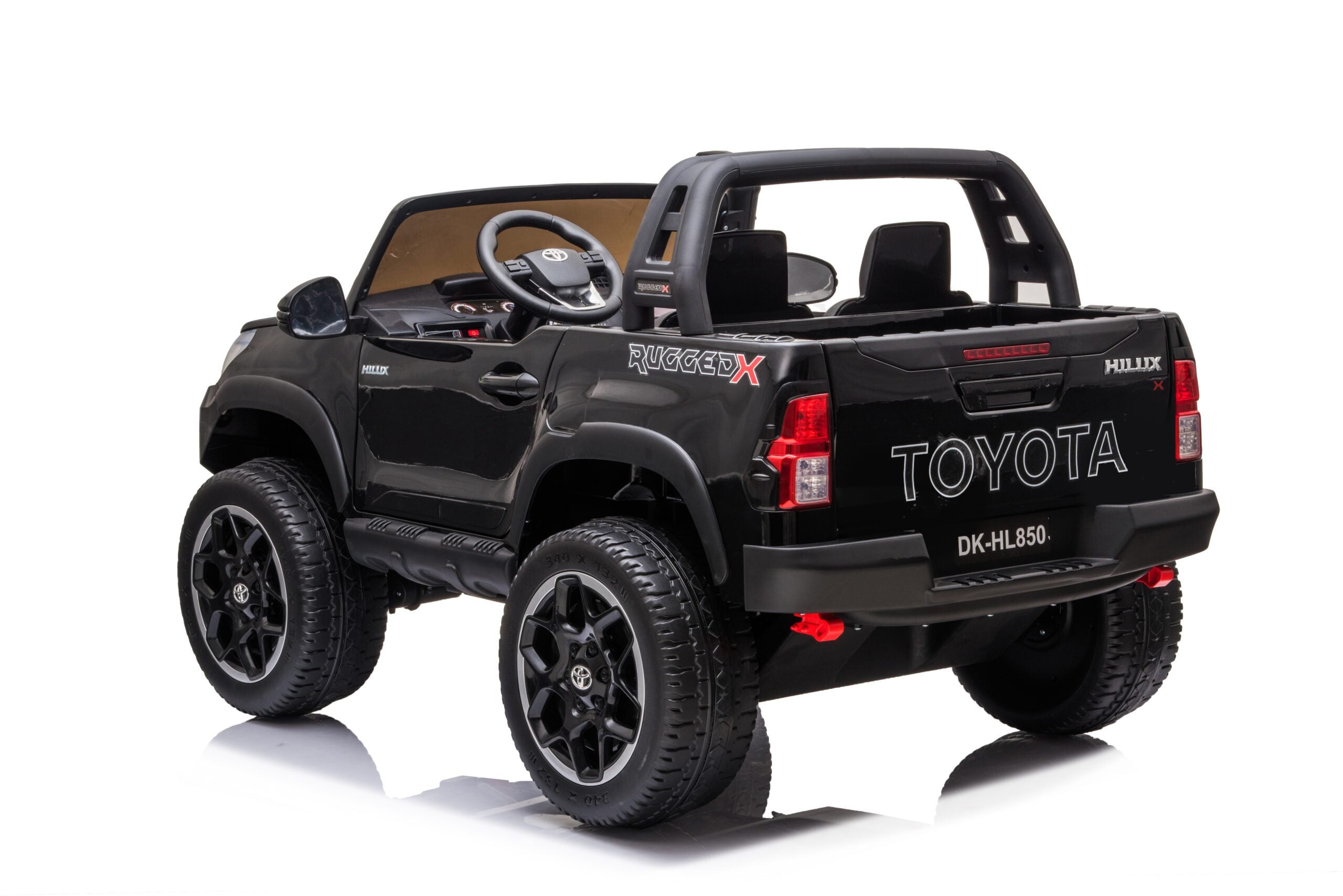 Black Licensed Toyota Hilux Rugged 24V Kids Ride-On Car with 2 seats, off-road tires, and realistic details