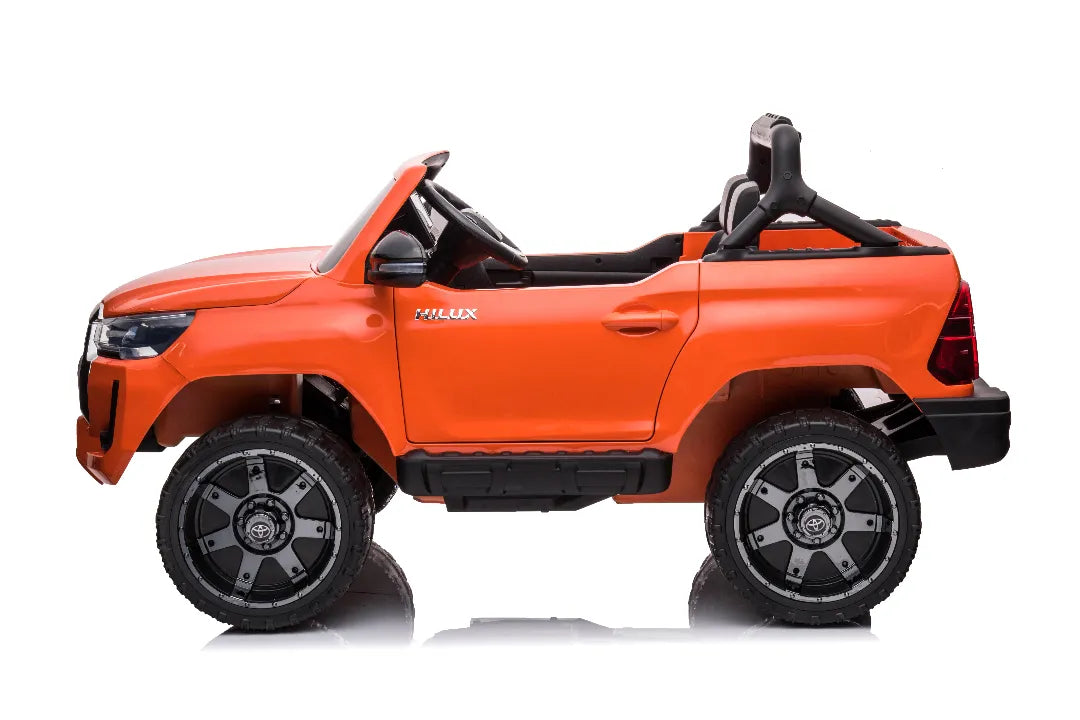 24V Toyota Hilux SR5 Kids 2-Seater Ride-On Ute – Orange Electric Car with Leather Seat
