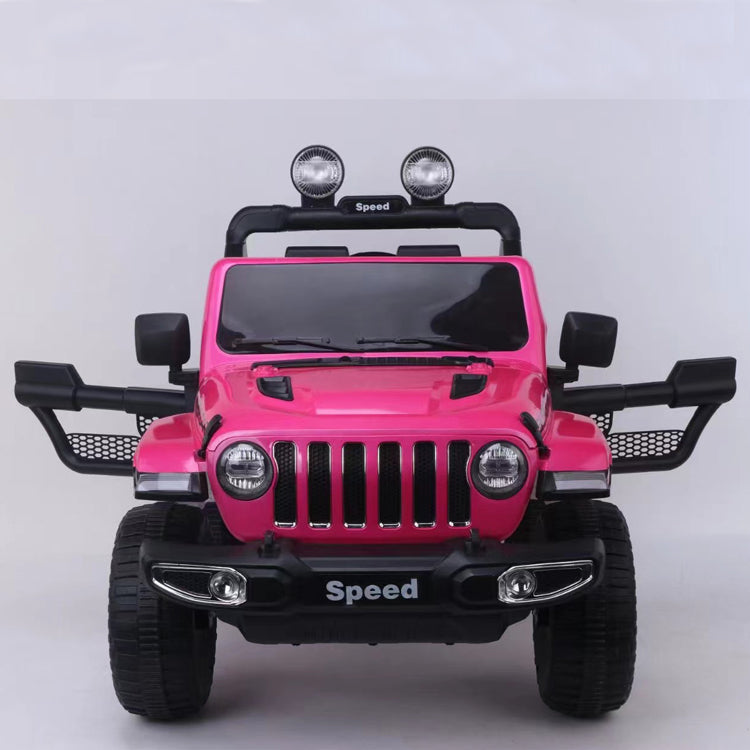 Front view of a pink 12V Jeep Wrangler Rubicon kids ride-on car with open doors and large tires on a white background