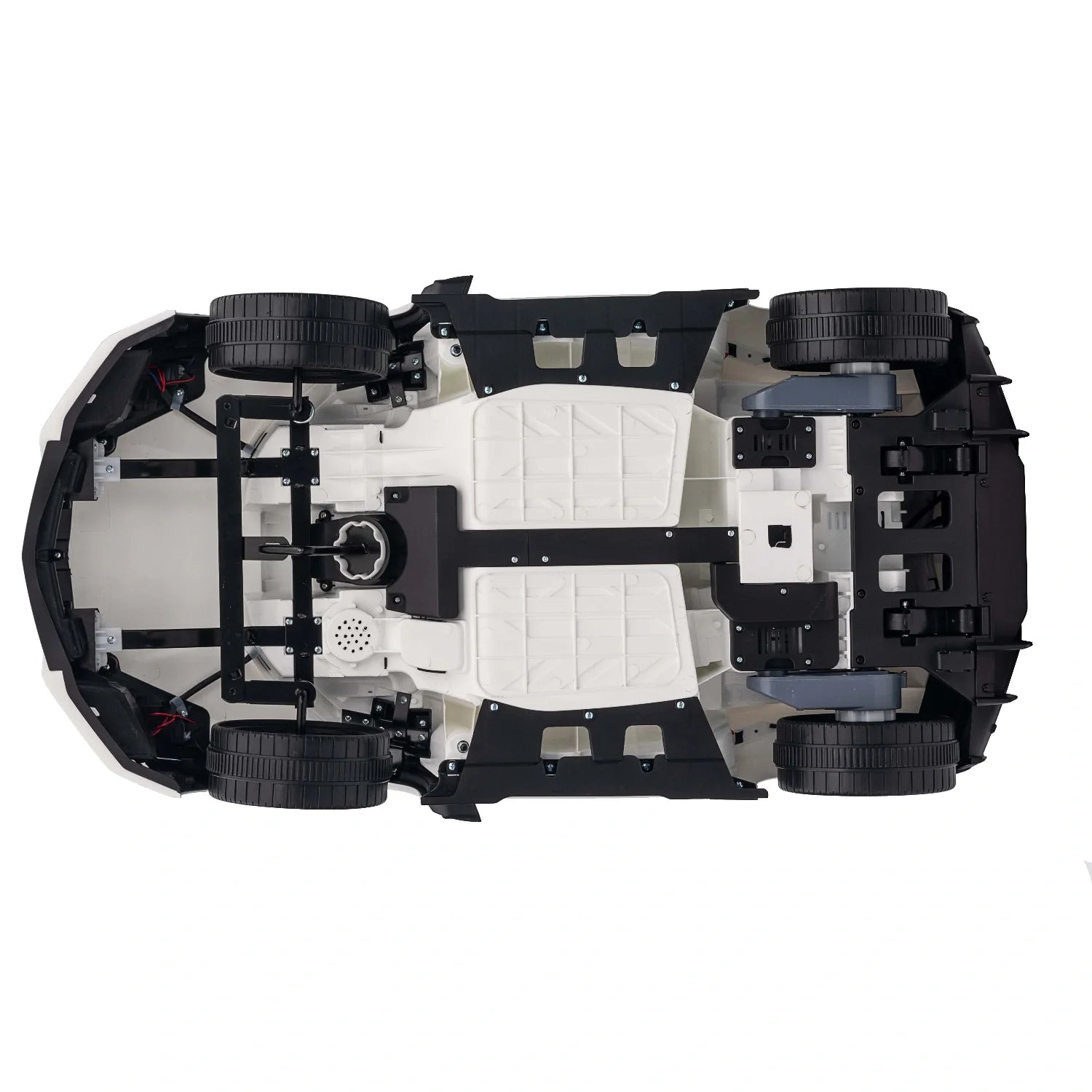 Underside view of white 12V licensed Lamborghini Revuelto kids electric ride-on car showing wheels and chassis details